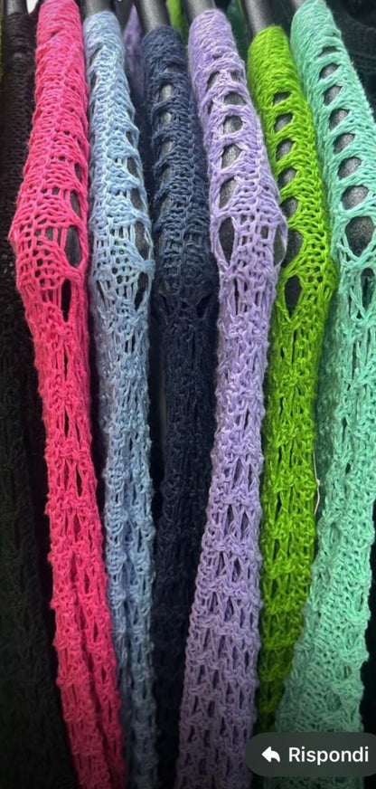 Cardigan bucherellato
