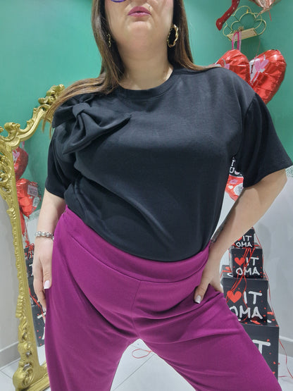 Pantalone zampa bottoni